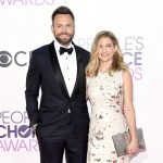 Host Joel McHale and Sarah Williams on the red carpet