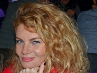 Ms. Olga Charlie