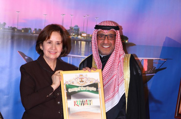 Ms. Lourdes Saab & H.E. Faisal AlHouli