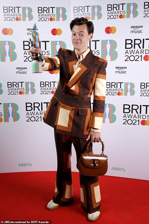 Lizzo Wore the World's Tiniest Handbag to the American Music Awards
